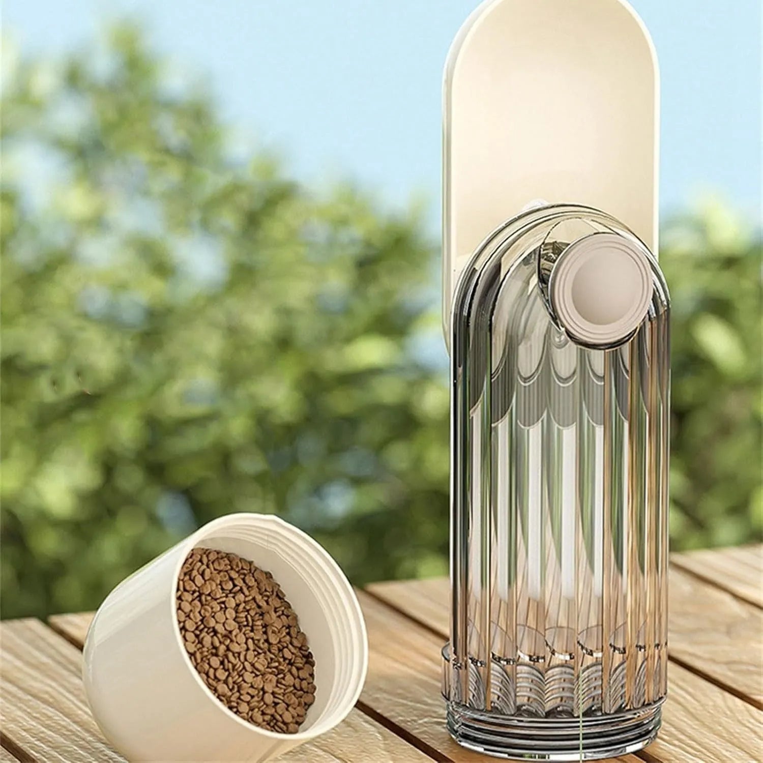 Beige and green foldable dog water bottle with food container, showing dimensions.