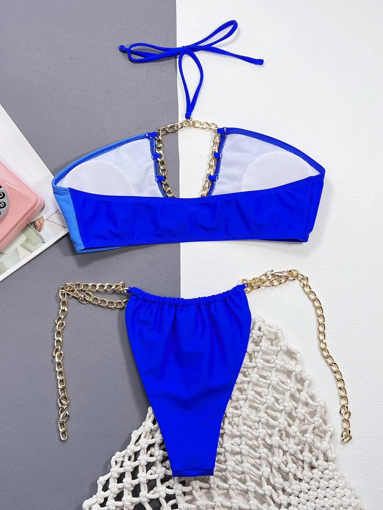 Solid blue women's bikini swimsuit set with nylon fabric construction