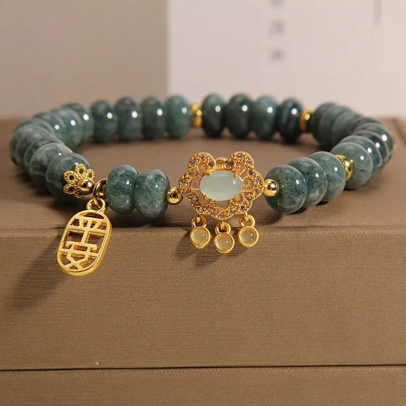Women's bracelet with emerald jade abacus beads and alloy safety lock clasp