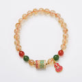 Hand-woven citrine crystal bracelet with five-sutra geometric pattern and 6mm beads