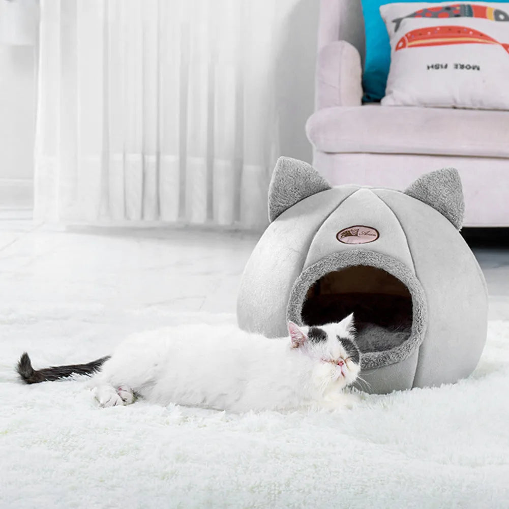 Large enclosed winter cat sofa bed with plush lining for indoor pet warmth