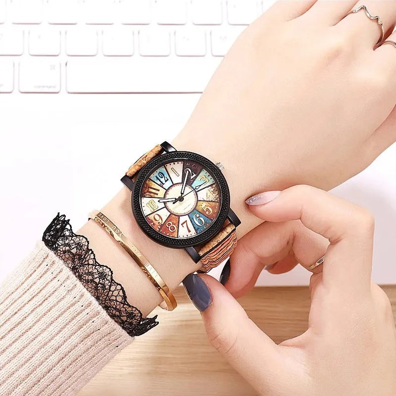Casual vintage women's watch with brown leather strap and silver 37mm round dial.