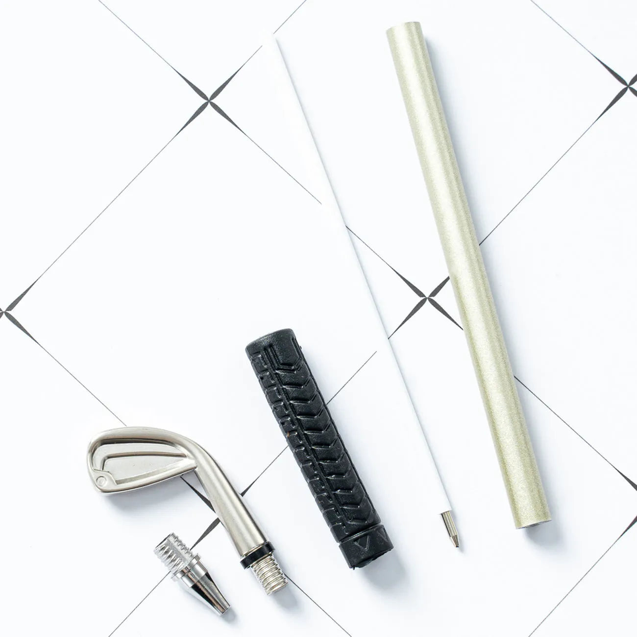 Three metal ballpoint pens with 0.7mm bullet nibs and suit golf design refills
