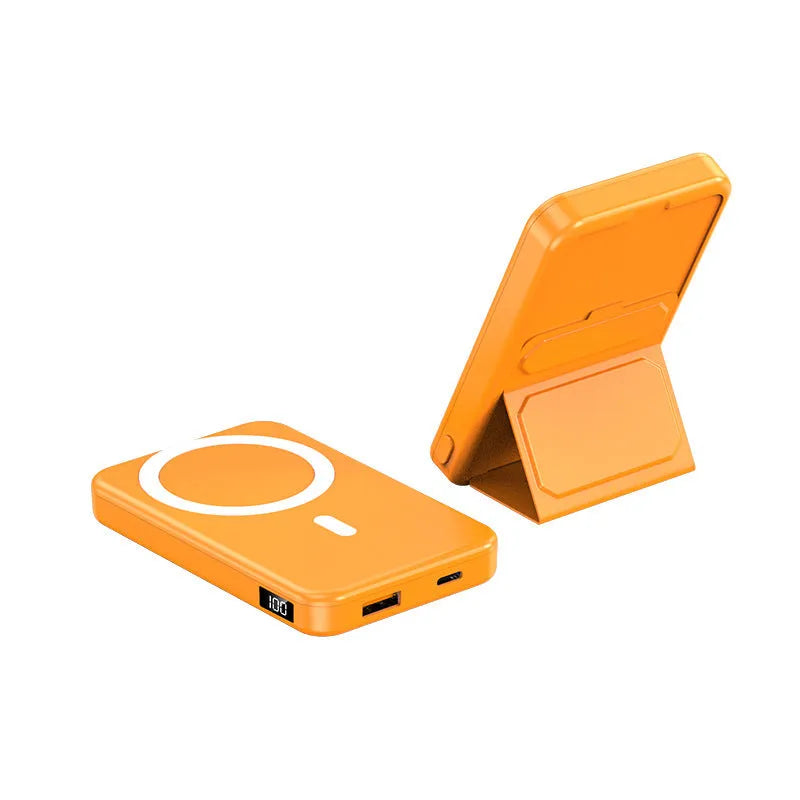 Magnetic wireless charging power bank with folding stand unfolded, shown in navy blue colour.