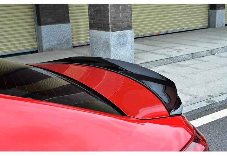 Large bright black sports tail blade trim for Mazda 3 Axela Exela rear bumper.