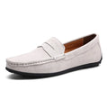 Men's suede leather Gommino loafer in brown, showing round toe and rubber sole.