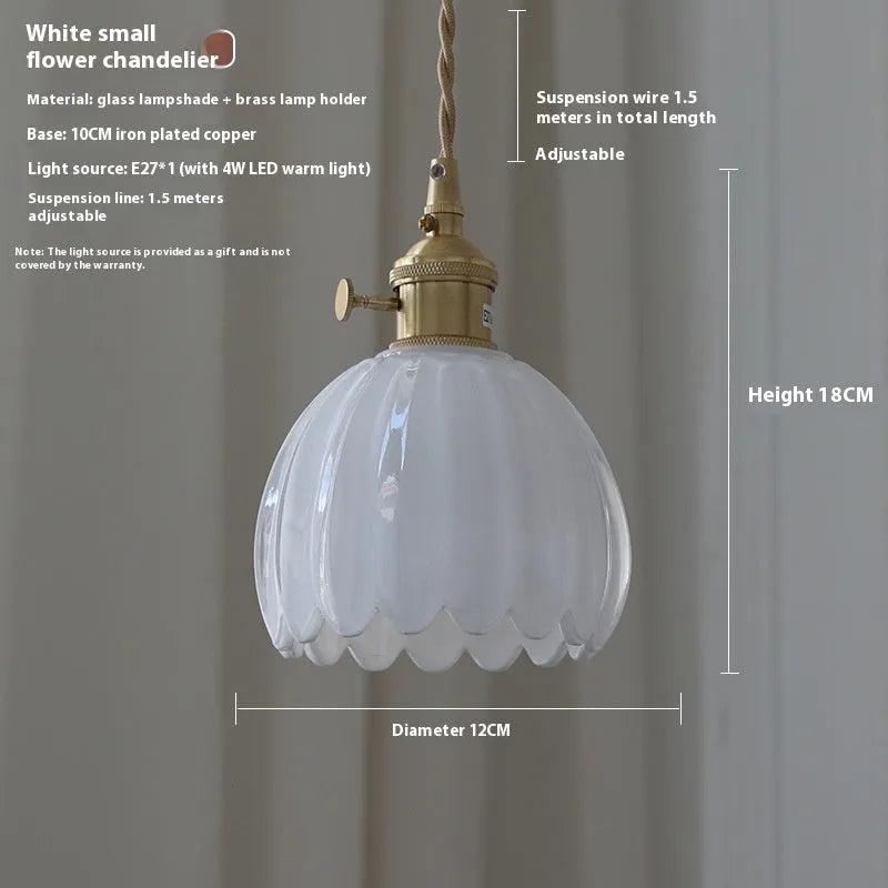 Nordic style bedside chandelier with a vintage glass flower shade in a choice of five colours.