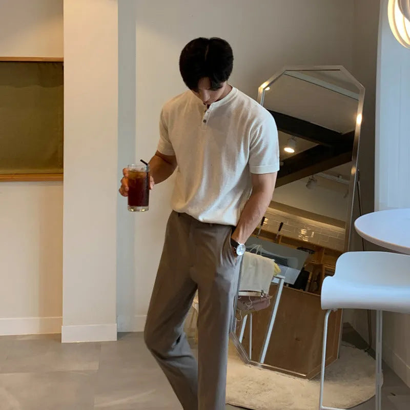 Men's black slim-fit short-sleeved knitted pullover shirt made from Vinylon fabric.
