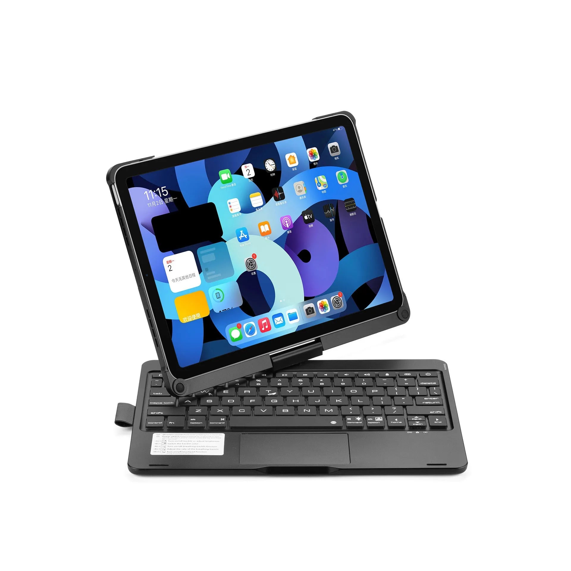 Rotating Bluetooth keyboard with backlit keys next to an iPad tablet