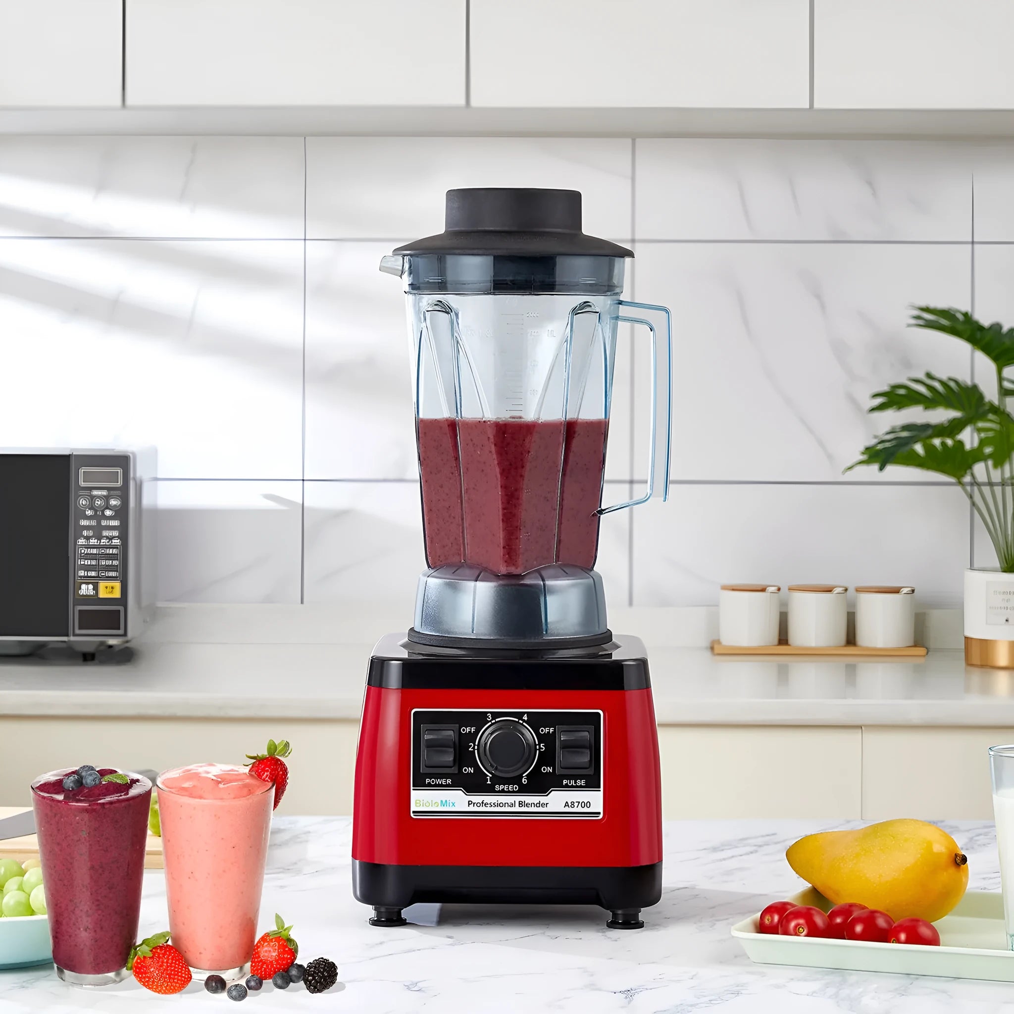 Red commercial blender with 2200W motor and 2L capacity container, industrial style construction