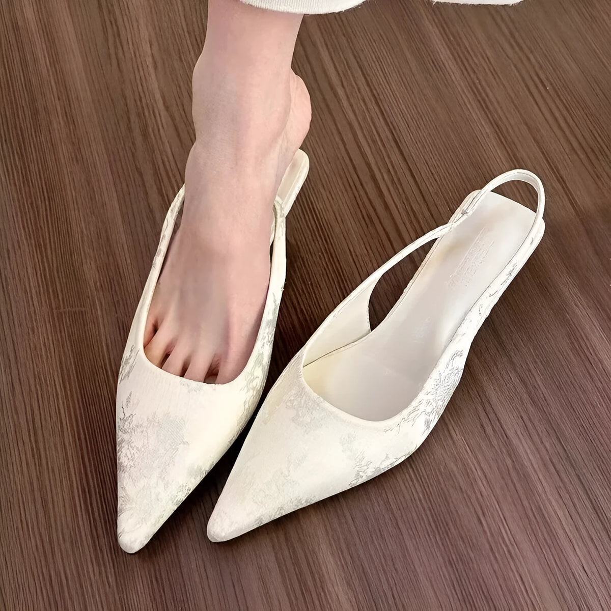 White faux suede mid heel stiletto court shoes with Mary Jane strap, pointed toe, and rubber sole, sizes 35-39