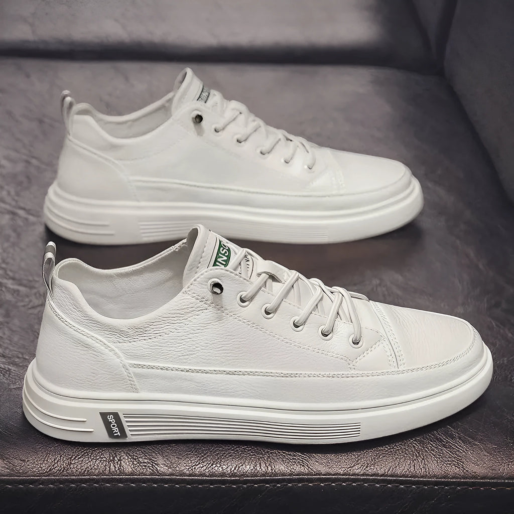 Men's white casual PU shoes with round toe and low flat heel on a plain background.