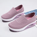 Women's mesh running shoes with air cushion in multiple colours showing round toe and mid-heel design