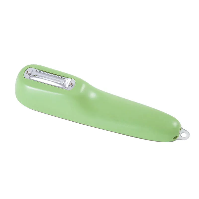 Dark green kitchen peeler with storage tube, showing stainless steel blade and non-slip handle.