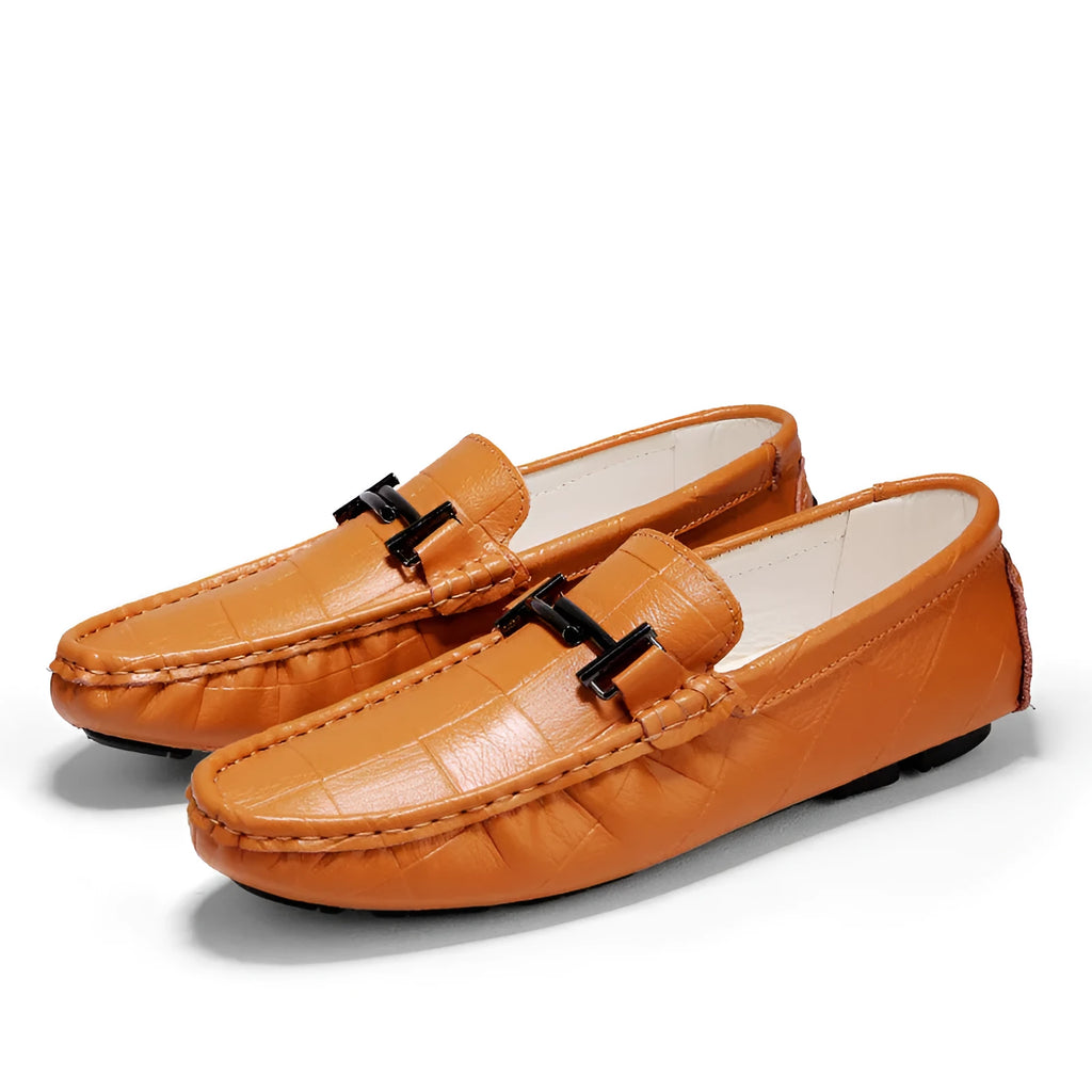 Men's black leather casual peas shoes with a belt buckle and rubber sole.