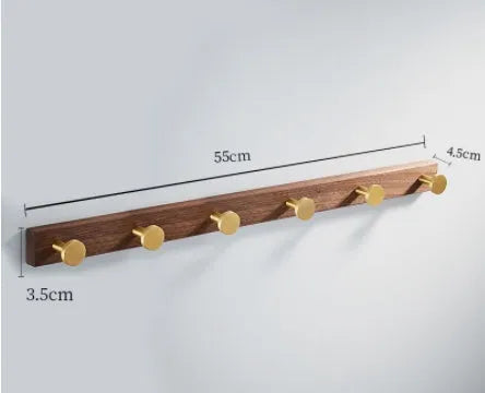 Black walnut bathroom clothes hooks with aluminium frame and brass finish in perforated row design