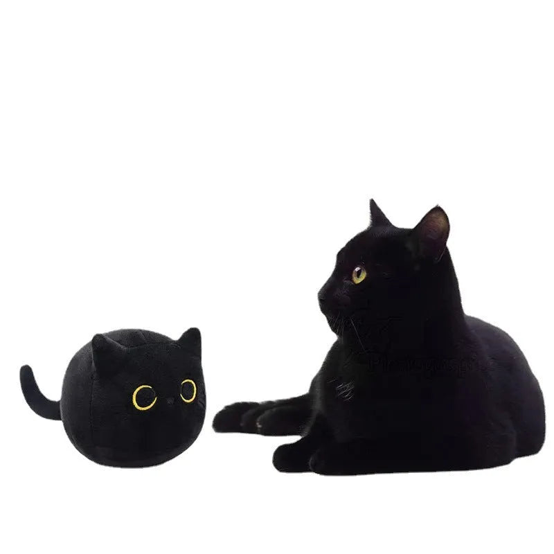Black fluffy cat plush toy stuffed animal shown as a soft pillow cushion approximately 35cm long.