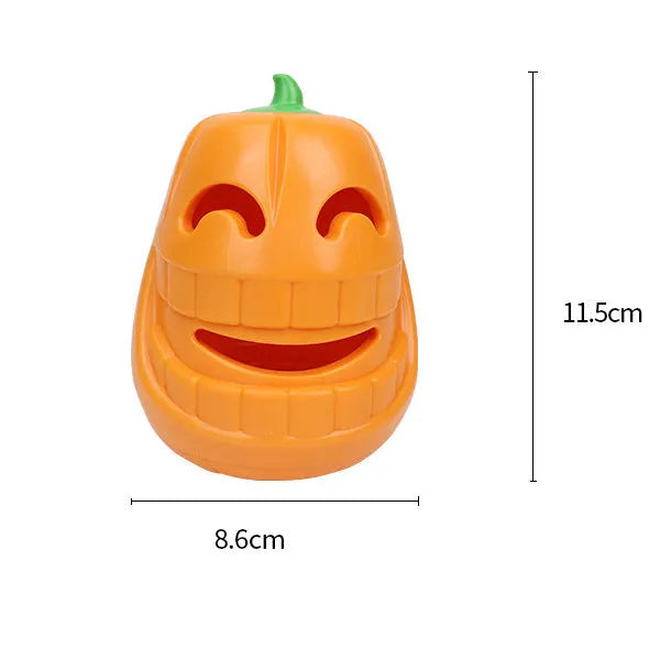 Red and orange Halloween pumpkin shaped interactive dog chew toy on a white background.