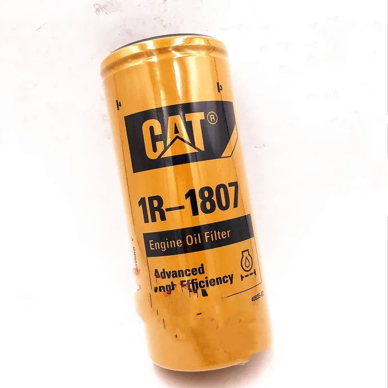 Yellow Caterpillar engine fuel water separator filter element, 262mm tall.