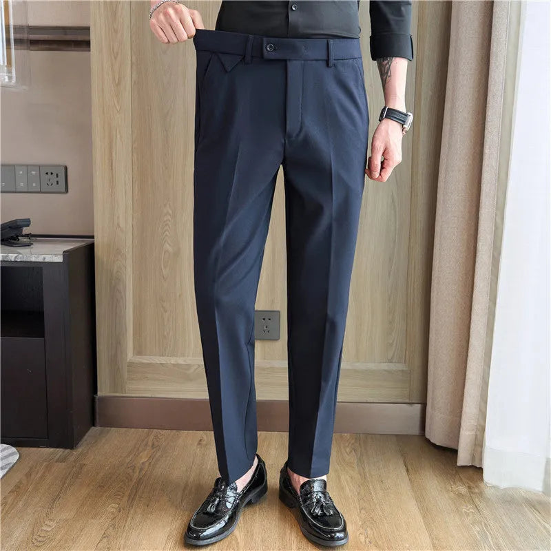 Men's brown suit trousers with waist stretch design, slim-fitting small straight cut, side view on hanger