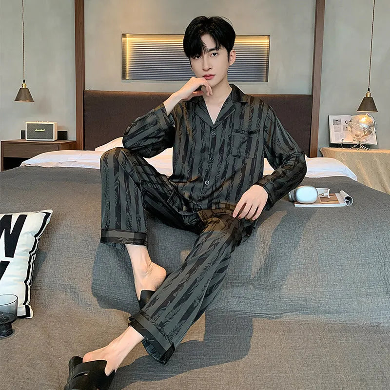 Men's black striped ice silk pajama set with V-neck top and elastic trousers