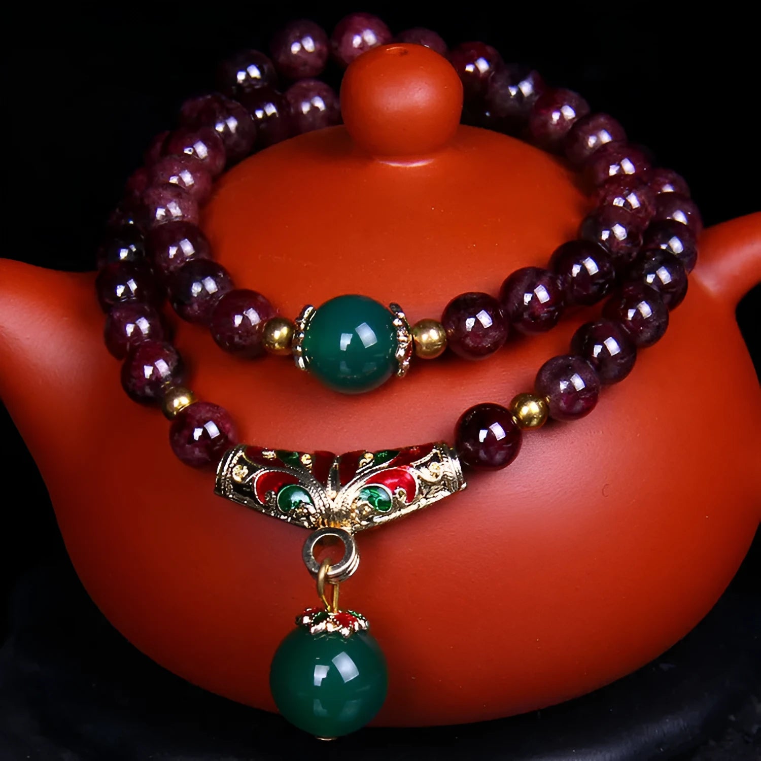 Natural garnet bracelet with 7mm stones, double ring settings and golden toad charm
