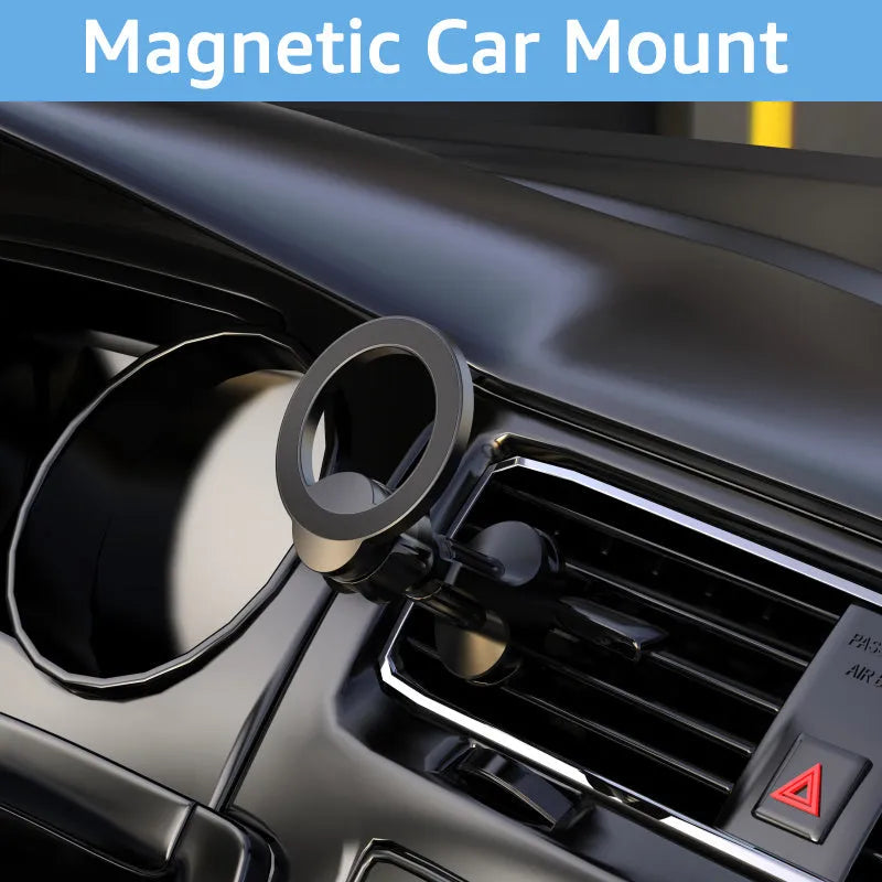 Black magnetic suction car phone holder mounted on a vehicle air vent, showing O-ring clip and magnet for phone attachment.