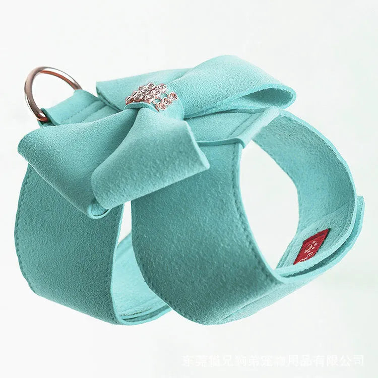 Dog wearing pink microfiber chest strap with decorative bowknot design