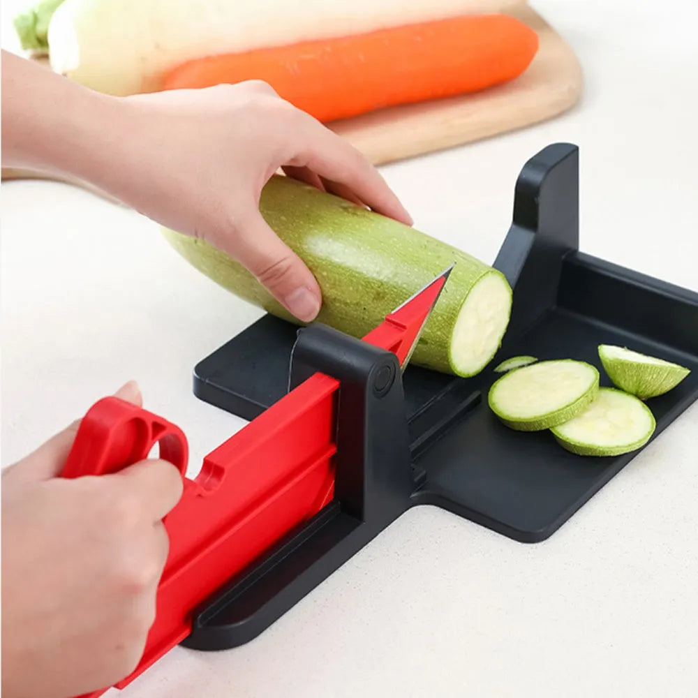 Green and red vegetable cutter with stainless steel blades for cutting carrots and potatoes