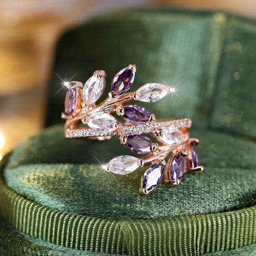 Adjustable horse eye design leaf ring in copper with zircon crystals, shown in a rose gold finish