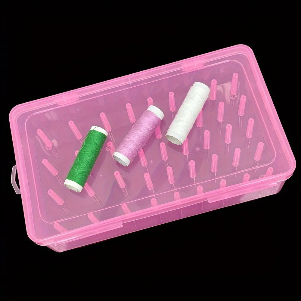 A transparent, pink, or blue plastic storage box with 42 small compartments for embroidery threads and craft supplies.