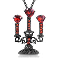 Women's silver Gothic necklace featuring a hollow candlestick pendant on a cross chain.