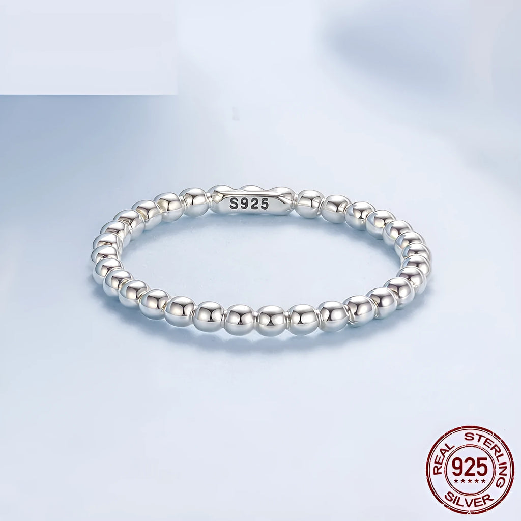 Silver bead ring with geometric shape and polka dot detail, stackable women's ring in sizes 6, 7, and 8.