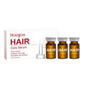 15ml bottle of hair root liquid treatment with ginger, rosemary, and pumpkin seed oils for the scalp.