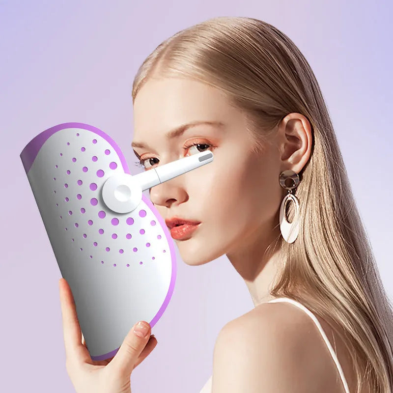 White and purple photon IPL beauty mask facial device on a flat surface