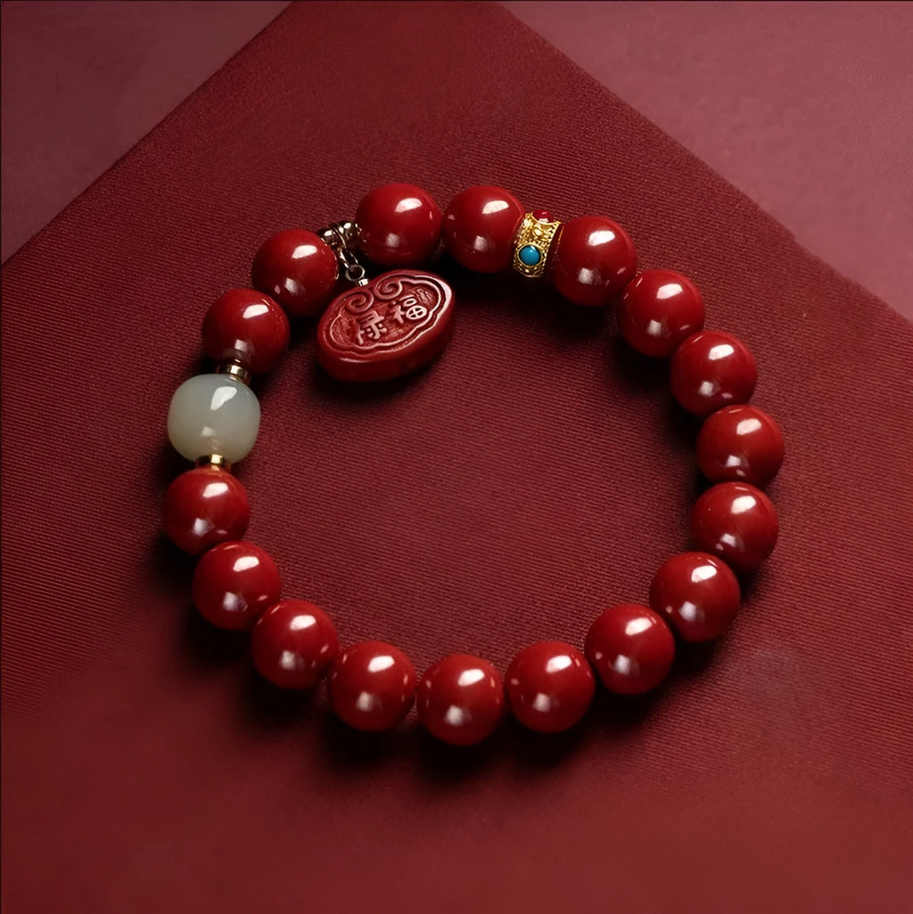 Red cinnabar bracelet with emperor sandstone carving featuring Ping An Fu Lu characters