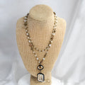 Adjustable tribal necklace with glass and stone pendant on two-layer chain in beige colour