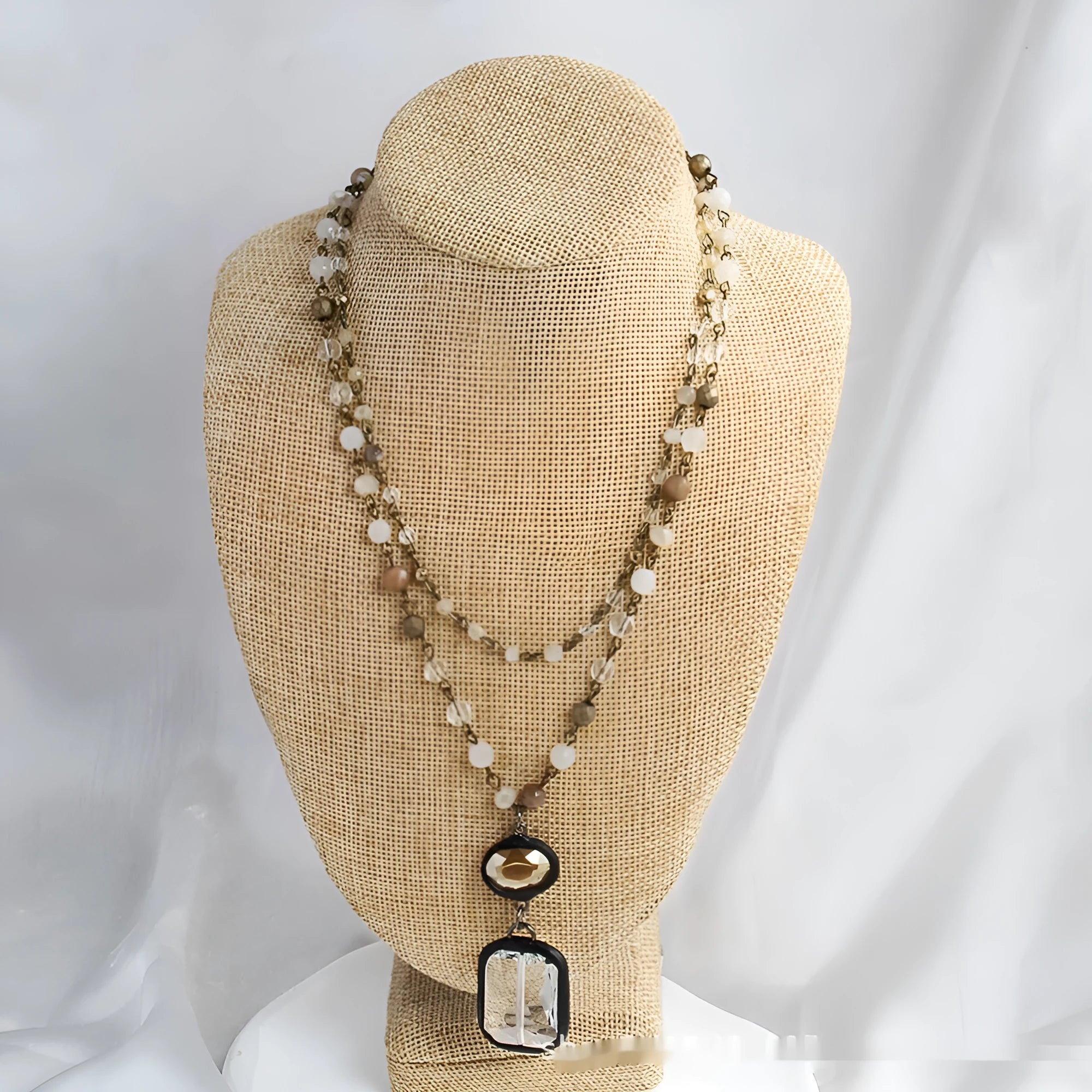 Adjustable tribal necklace with glass and stone pendant on two-layer chain in beige colour