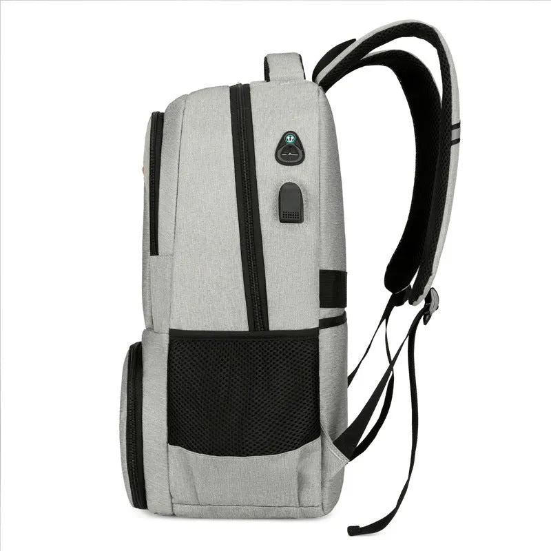 Insulated Oxford cloth picnic backpack in grey, showing main compartment and curved shoulder strap.