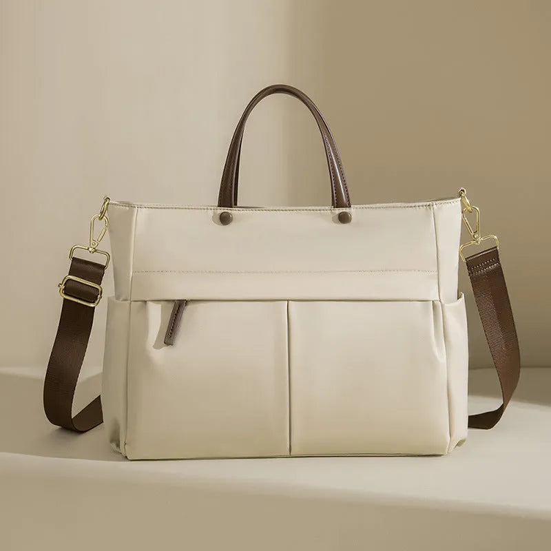 Women's urban simplicity style Oxford cloth laptop briefcase in elegant black with contrast stitching.