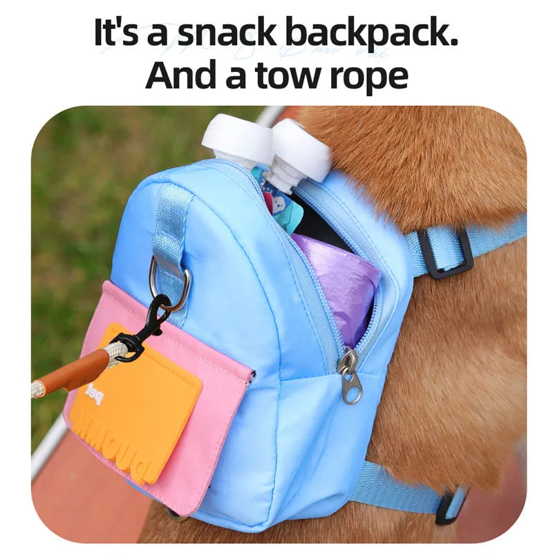 Adjustable dog backpack with storage compartments in blue colour showing harness straps and mesh panels
