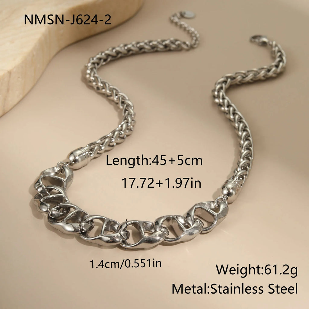 Stainless steel geometric chain necklace with 18K gold plating in gold or steel finish.