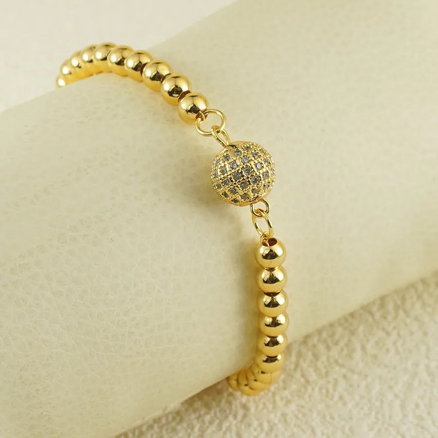 Arabic-style copper bracelet with a single zircon ball on a heart shape for women.