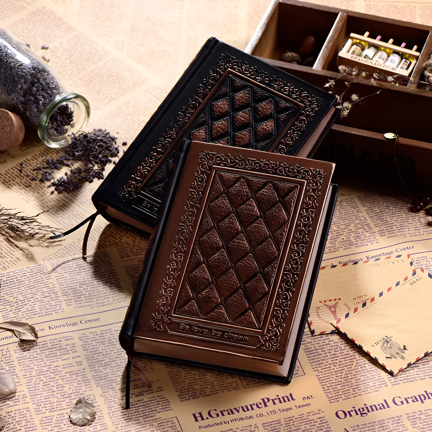 Embossed faux leather notebook in super thick design showing bronze and black gold colour options