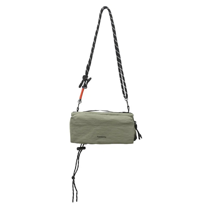 Women's sports crossbody bag nylon pillow shape 22cm length 4cm width 9cm height stitching black
