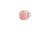 Pink adjustable cotton dog harness with chest and back handle on a small dog.