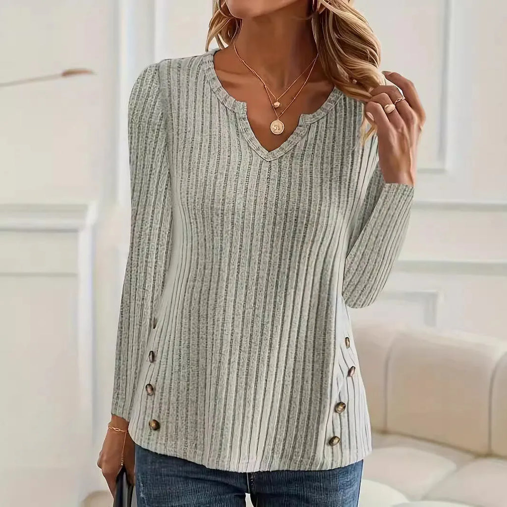 Men's grey green button-front V-neck knitted sweater on a hanger.