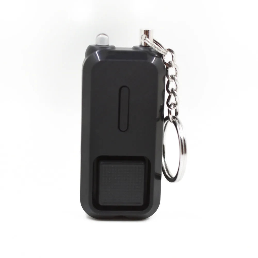 ZQ-202 personal safety alarm in pink colour showing compact 65x30x12mm dimensions
