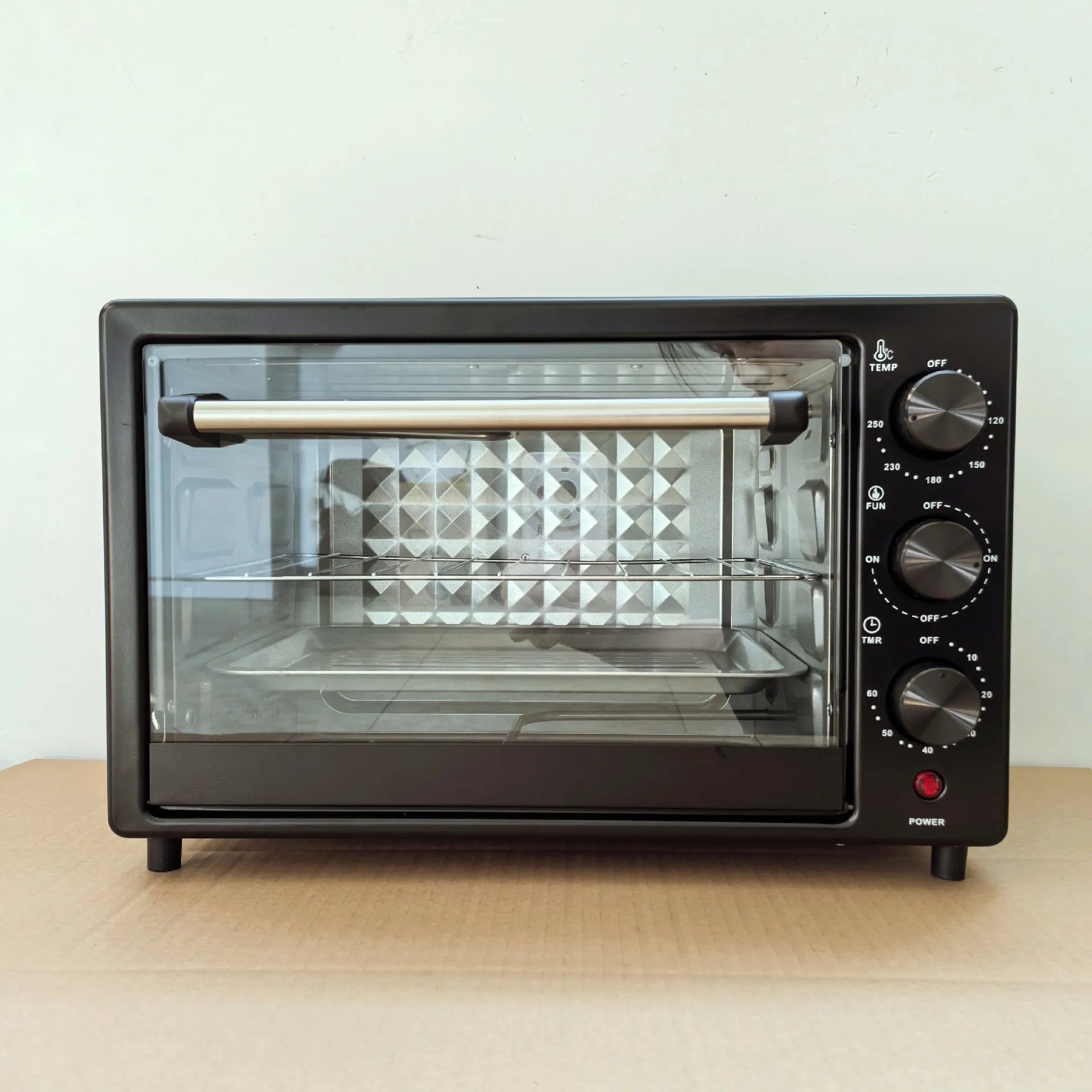 12L household electric oven in black with double-layer interior and mechanical dials, galvanised steel body