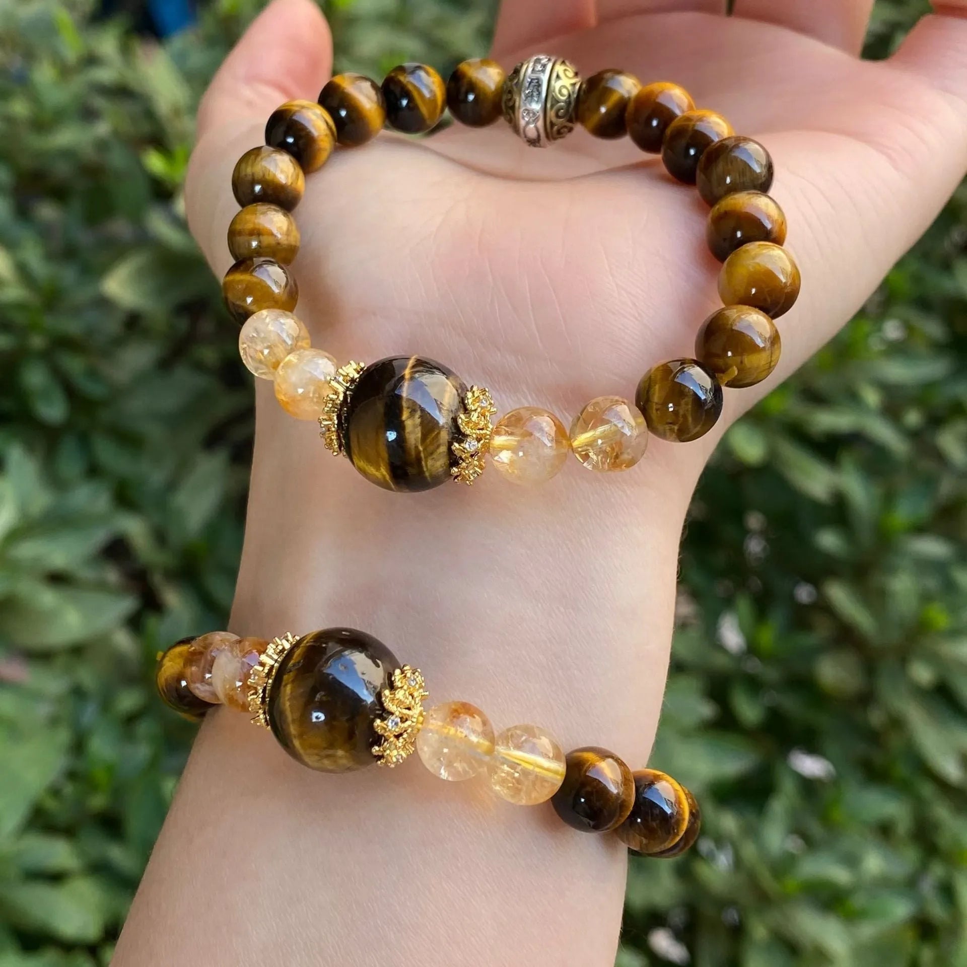 Handmade unisex crystal bracelet with diamond-studded gourd charm and mix of 8mm and 10mm prayer wheel, topaz, and disc beads.
